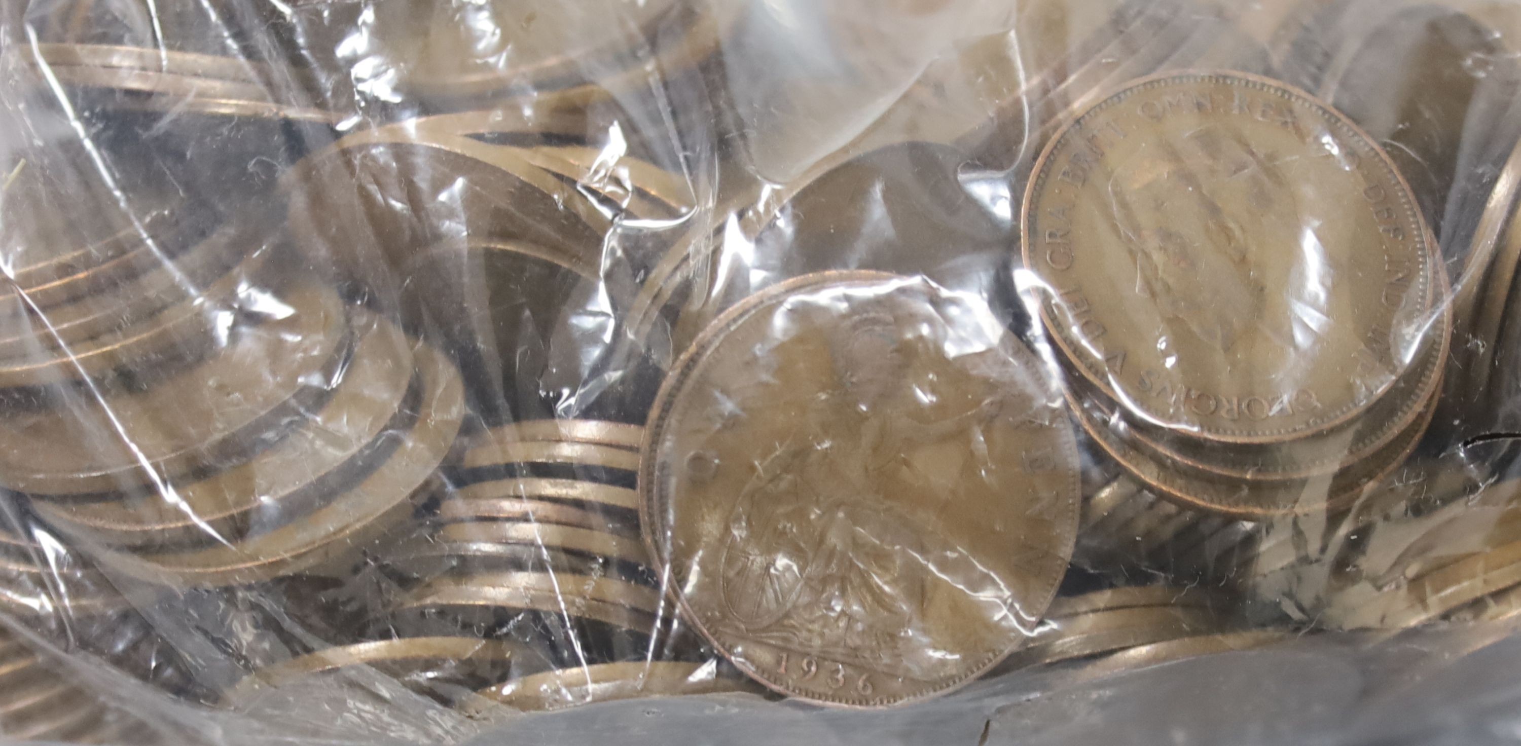 A group of UK pennies and half pennies and 20th century European coins